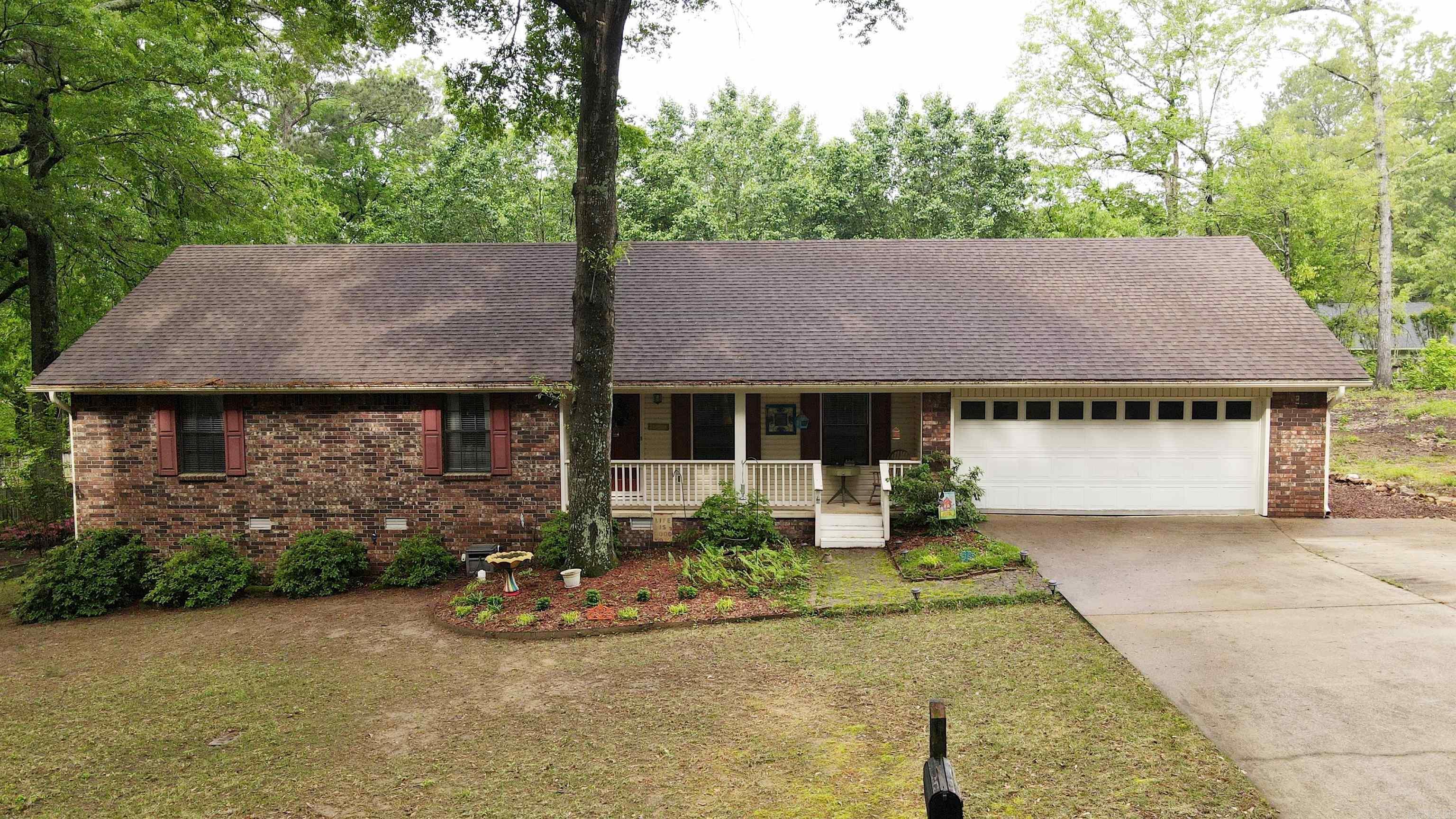 Beautiful open concept home with tons of cabinets in the large galley style kitchen. Tankless water heater, counter tops and gas range updated in 2019. Plenty of storage with 2 coat closets and a large linen closet. Fantastic fireplace feature with gas logs less than a year old. Large wood deck with fenced in backyard is perfect for entertaining or fur babies. Built in storage/shop with lights and electric outlets under the house. 2 car garage with mini split a/c that could be made into another workable space and additional parking pad added to driveway. Great Location! Come check this jewel out!