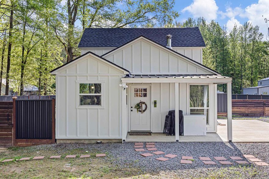 Newer Construction + Modern Farmhouse Style — Don’t Miss This One!  Built in 2023, this 2-bedroom, 2-bath home offers a thoughtfully designed layout with 688 total square feet. The two-story floor plan includes 478 sq ft on the main level and 210 sq ft upstairs, making smart use of space while maintaining a comfortable, open feel.  Inside, you’ll find clean finishes, a modern farmhouse design, and a warm, inviting atmosphere. Every inch of this home is designed with an efficient layout that promotes easy living.  The fully fenced backyard adds convenience for pets or outdoor enjoyment, and the full 1-acre lot offers plenty of room to enjoy the outdoors, garden, or expand to fit your needs.  Perfect for a first-time buyer, downsizing, or an investment opportunity—this home is move-in ready and full of character!