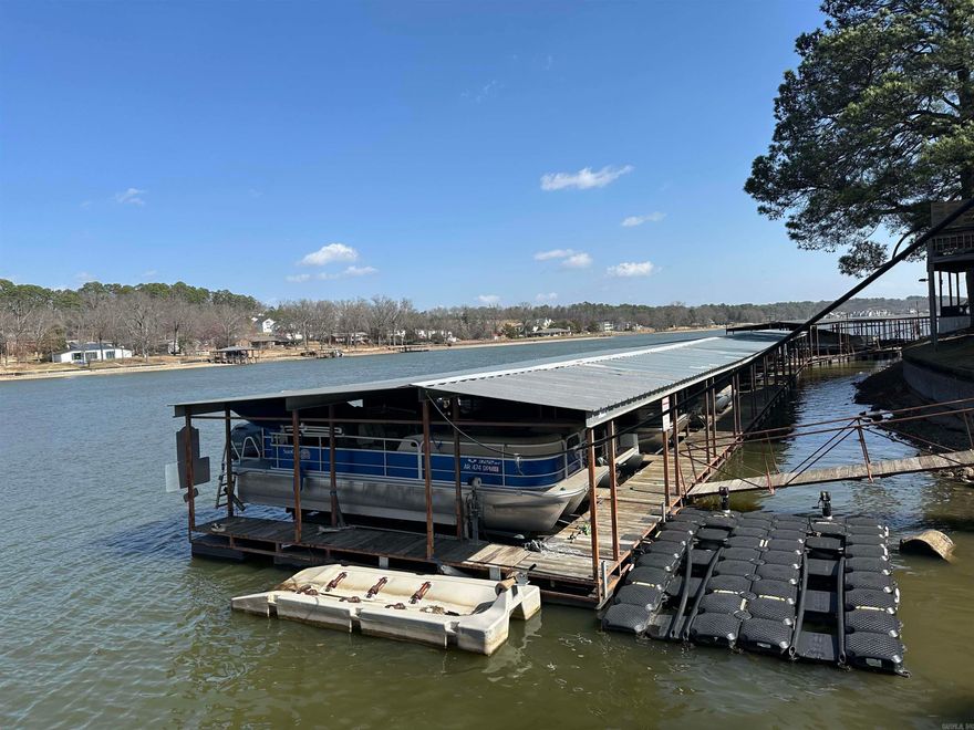 Afordable way to have your weekend getaway at the lake with a covered boat dock! Many memories have been made here from the swim dock, to the sitting area, the well equipped clubhouse available to owner, this lodge has it all. Nice outdoor pool for cooling down in the summertime. Boat docks are right out front next to the boat ramp so very efficient. This unit looks directly out to the lake and ramp. The kitchen window has a lake view out the back as well. Great spot on the point with lake life all around. Mature owners and family friendly. This building has 3 units and got a band new roof to include attic space and pull down stairs. A big upgrade from the former flat roof. Very quiet small complex awaiting you to come spend the weekend! Furnished or unfurnished.