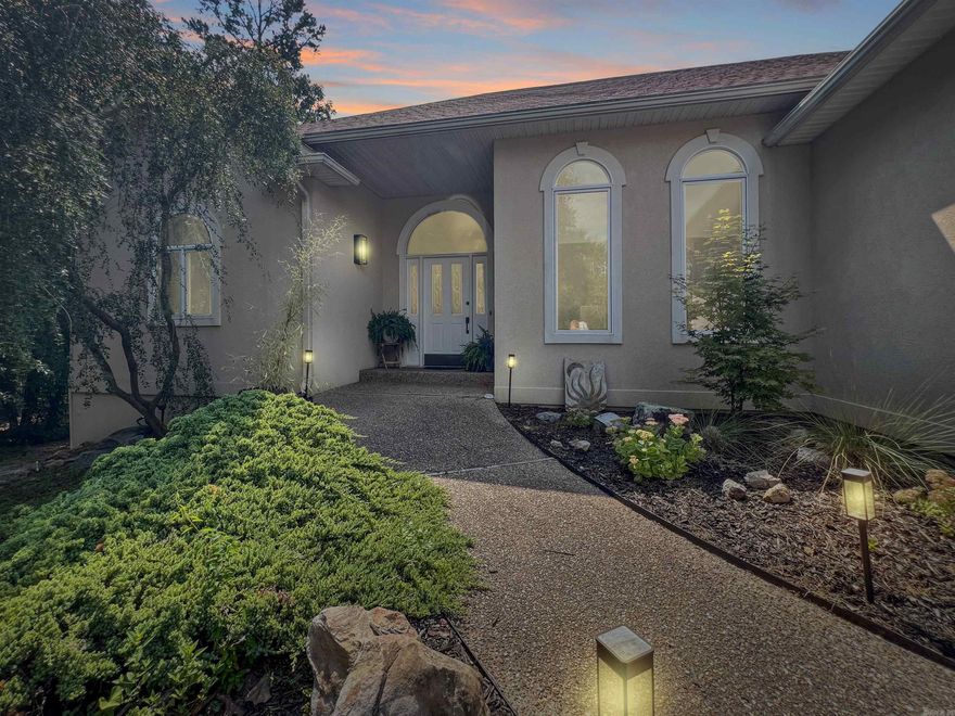 Fully Remodeled on the 5th Green of Coronado Golf Course – Pool-Sized Yard! Move-in ready and beautifully updated, this single-level home delivers modern style, convenience, and one of the most desirable golf course locations in Hot Springs Village. Tucked on a quiet cul-de-sac with a spacious pool-sized yard, it overlooks the 5th green of Coronado Golf Course for unmatched views and lifestyle. Inside, the light, open floor plan shines with fresh paint, new LVP flooring, quartz countertops, sleek fixtures, stylish lighting, and all-new ceiling fans. The kitchen flows seamlessly into the living and dining areas, while large windows fill the home with natural light. With three split bedrooms plus a versatile study, the design offers flexibility for a home office, media room, or guest space. The private primary suite features a fully renovated bath, massive walk-in closet, and direct access to a screened porch. Extras include a level driveway, oversized garage, central vacuum, 500-gallon propane tank, sprinkler system, abundant storage, and a 2017 roof. Homes like this—fully remodeled, golf course frontage, cul-de-sac, —rarely last. Schedule your showing today!