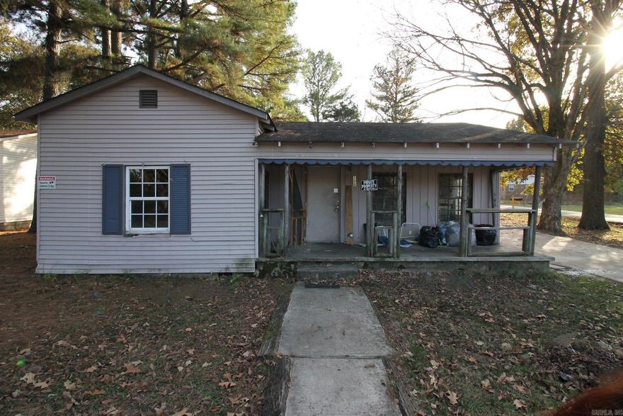 Unlock the potential of this investment opportunity! This fixer-upper boasts 3 bedrooms, a bonus room, and 1 bathroom, offering a canvas for your vision and creativity. This property presents a chance to craft a dream space with versatile rooms that can be transformed into cozy bedrooms, a home office, or an entertainment area - the possibilities are endless. While it requires renovation and TLC, this property's layout offers a foundation for customization. The spacious bonus room is a unique feature that could serve as a multifunctional space, from a playroom to a home office. The property sits on a corner lot. With your personal touch and renovation efforts, this property has the potential to become a lucrative investment or a charming family home. Conveniently located near amenities, schools, and transportation, this fixer-upper presents an exciting opportunity to reimagine and revitalize a property into a valuable asset. Don't miss out on the chance to turn this diamond in the rough into a shining gem. Schedule a viewing today and begin your journey to transforming this 3-bedroom 1-bathroom investment property. Sold AS-IS Where is. Now offering Owner Financing!