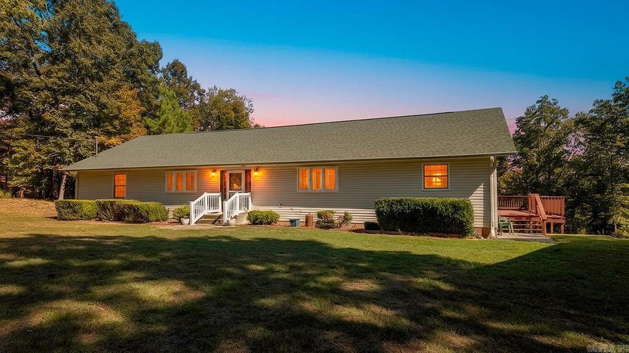 Country comfort meets convenience on 2 mostly wooded acres near Spring River. This 3 bed, 3 bath home offers spacious indoor-outdoor living with a vaulted open-concept great room and a large covered back porch—perfect for relaxing, entertaining, or watching wildlife. The primary suite features a walk-in shower and jetted tub for end-of-day unwinding. Two more bedrooms and baths offer plenty of space for family or guests. Peace of mind comes with a new roof and HVAC in 2024.  Need storage or workspace? A 32x24 shop is ideal for hobbies or equipment, plus a 10x16 outbuilding adds extra storage. The land is private, low-maintenance, and just off US 63 for quick access to everything.  Outdoor fun is close by—float, fish, or kayak the Spring River, or explore a nearby state park. Located minutes south of Mammoth Spring (go Bears!), you're close to schools, shops, and dining, yet tucked away in a peaceful setting.  If you're looking for a move-in-ready home with room to breathe and play, this Fulton County gem has it all.