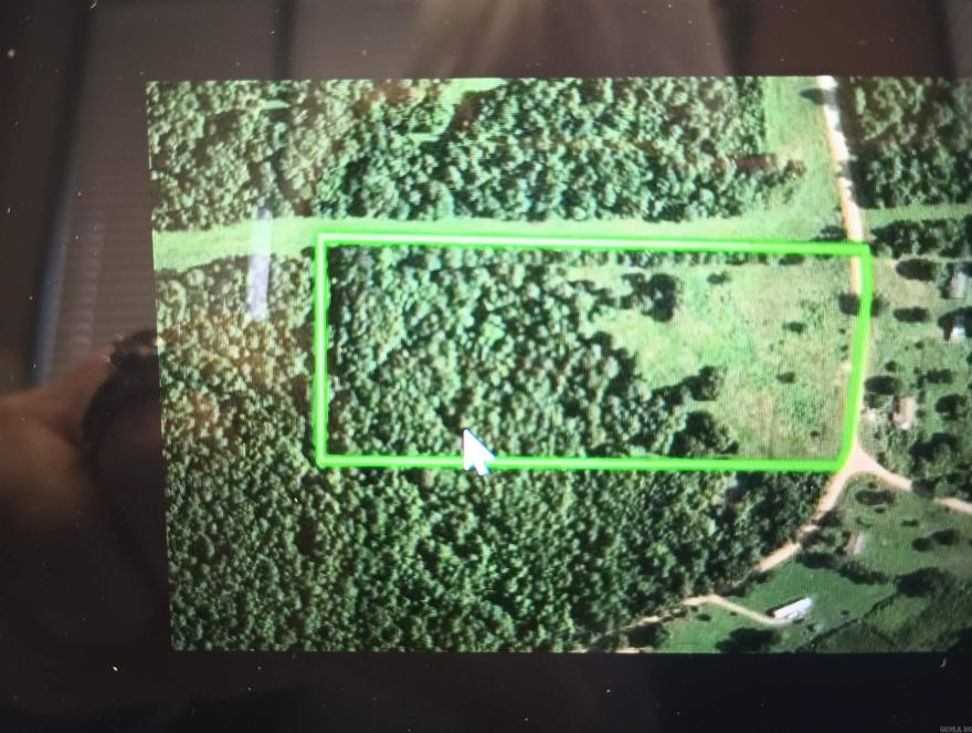 Escape to the Country! 10.80 acres (m/l)! Approximately 1/2 cleared. Fenced and cross fenced. Great hunting area. Bring your camper and hook up to the electric and water available on the property.Empower Available.  Several spots suitable for building that dream home. SEE Agent Remarks.