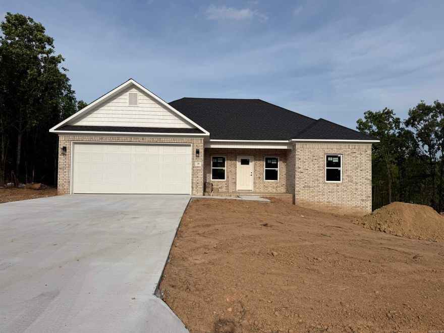 New construction home nearing completion! This thoughtfully designed brick home offers a spacious open-concept layout with a large living area that flows seamlessly into the kitchen and dining space—perfect for everyday living and entertaining. The kitchen is set to feature modern cabinetry, a central island, and ample workspace.  The primary suite will include a private bath with a walk-in shower and stylish finishes, while additional bedrooms provide flexibility for family, guests, or a home office. High ceilings and abundant natural light enhance the home’s airy feel.  Situated on a private lot with a two-car garage, this property offers peaceful surroundings with room to enjoy the outdoors. Don’t miss this opportunity to own a brand-new home in a desirable area!