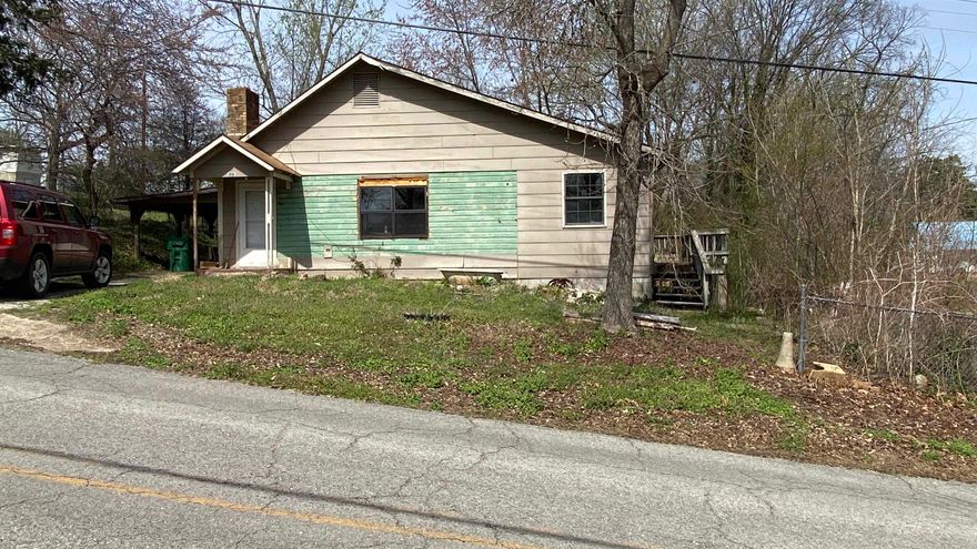 Investor opportunity! This 2-bedroom, 1.5-bath home sits on two lots (approx. 0.2 acres) in Calico Rock, Arkansas. Located on a paved street, this property is just minutes from the White River and other local attractions. This fixer-upper home features 1,394 square feet of living space and needs extensive work; however, it provides excellent value at only $40,000. This property is perfect for investors, flippers, or DIY buyers that are seeking affordable entry into the Ozark real estate market.  For more information, contact Dale Ivy at 870-373-3677 or United Country Ozark Realty at 870-368-4155.