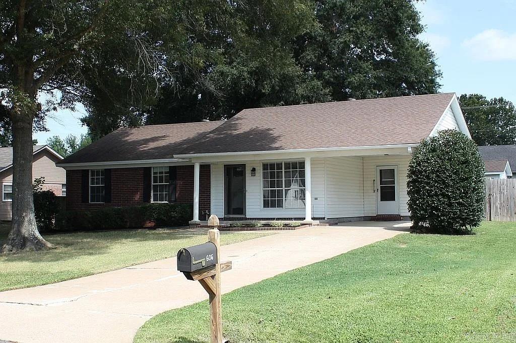 *New photos coming soon, but available for immediate showings. Schedule your private showing this weekend before it's gone!* This charming home offers a spacious living room with a large picture window, a generous master bedroom, and an open kitchen/dining area featuring a pantry and ample cabinet space. You'll love the oversized laundry room and the abundance of storage throughout. Enjoy relaxing on the welcoming front porch or the screened-in back porch overlooking the large, privacy-fenced backyard. An outdoor storage building adds even more convenience. Recent updates include stylish tile and laminate flooring, kitchen countertops and backsplash, ceiling fans, fresh paint throughout, garbage disposal, and a newer roof. A must-see property that combines comfort, function, and value!