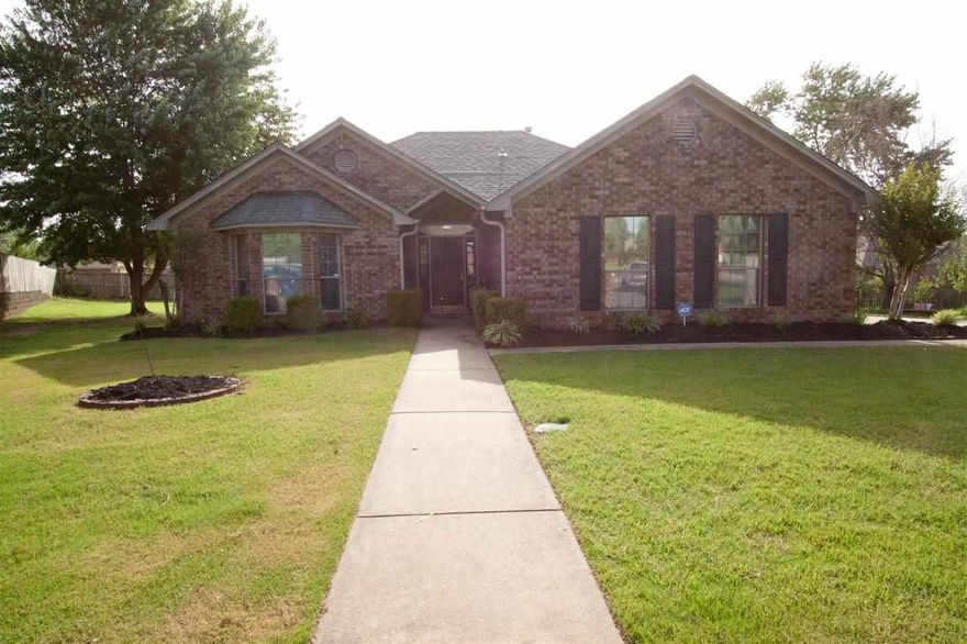 Unique home with raised and cathedral ceilings, granite in kitchen and 2 hot water heaters. Master bathroom has cable outlet and phone jack.  Large pie shaped lot on cul-de-sac.  Pergola covered patio with built in seating.  Also, has all season porch with screened/removable glass windows and door to patio.    Home is walking distance to Julia Lee Moore in a great neighborhood with perimeter fencing.  .