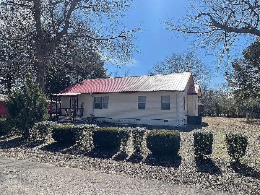 Charming 3-Bedroom Home with Workshop, Recent Upgrades & Spacious Yard Welcome to this beautifully updated 3-bedroom, 1-bath home located in a quiet, small-town neighborhood. Nestled directly across from a church, this home offers peace, privacy, and a strong sense of community. Step inside to a warm and inviting layout featuring a spacious living room, dedicated dining area, and a functional kitchen perfect for everyday living. Recent interior updates include new modern lighting in both the living and dining rooms, adding a fresh touch to the home’s classic charm. The property also features central heat/air for year-round comfort. Outside, enjoy the benefits of a brand-new metal roof and new siding that enhance curb appeal and provide long-term durability. The large yard is filled with beautiful bushes and mature trees, offering plenty of space for outdoor living, gardening, or entertaining. A backyard workshop and extra secured storage provide excellent space for hobbies, projects, or seasonal items.