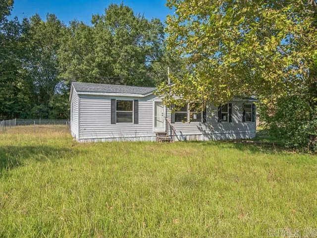 Handy man special 3 bed 2 bath 1254 sq ft mobile home on 1.3 acres. The home will need repairs. The steps leading up to the home need work, and the home could use new decks, flooring throughout, paint, cosmetics etc.