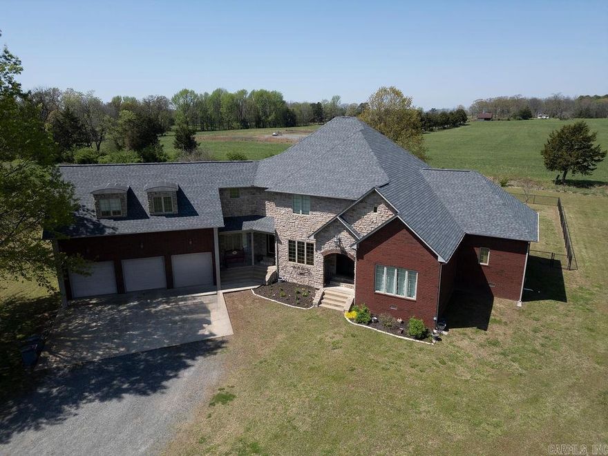 NEW ROOF JUST PUT ON!! NEW HVAC INSTALLED IN SUMMER OF 2024. ENERGY EFFICIENT HOME. This charming country home sits on a spacious 3-acre lot, offering a perfect blend of comfort and privacy. Featuring five generously sized bedrooms and three bathrooms, the home provides plenty of space for a growing family or those who enjoy hosting guests. A dedicated office allows for a quiet and productive work-from-home environment. The fenced yard ensures both security and privacy, creating an ideal space for children, pets, or outdoor gatherings. For relaxation or entertainment, a covered patio extends the living space outdoors, making it perfect for enjoying the peaceful country setting.