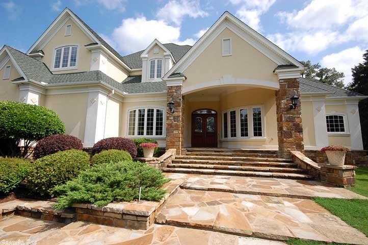 STUNNING HOME in mint condition nestled on a 3 acre ridge w/scenic views & abundant wild life. Walls of glass and floor-to-ceiling windows frame panoramic wooded views from every room. This homes boasts of many unique architectural ceilings, walnut raised paneling w/built-in desk in office, heated marble floors in master bath, Advantium oven & warming drawer in kitchen, two story travertine fp in the living room & generous use of travertine, marble and granite on the floors, countertops and accent pieces.