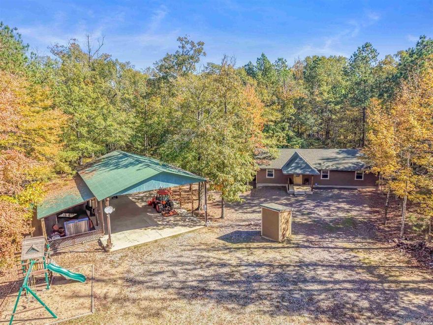 Beautiful 3.24 acre property near Lake DeGray  Welcome to your own private retreat just 1 1/2 mile from Lake DeGray & minutes from a nearby golf course! This unique 3.24 acre property features a comfortable 2-bedroom, 2 bath home along with an incredible 30X50 covered pavilion designed for gatherings, entertaining & outdoor living. Also includes a outdoor storage shed cover for boats, all terrain vehicles or work equipment.   The pavilion is the perfect place to host friends & family- complete with a stone fireplace, kitchen bar for dining, & a grill area ready for your next cookout. A full-size bathroom with shower is conveniently located under the pavilion, offering comfort & convenience for guests. There is also two RV hookup locations with water & sewer connections, including one directly under the pavilion-ideal for visitors or extended stays. Bonus full bath underneath pavilion with stackable washer & dryer. The nearby home offers stylish finishes throughout, including tile floors, knotty Alderwood cabinets & granite countertops.   Escape the ordinary , your private getaway awaits!