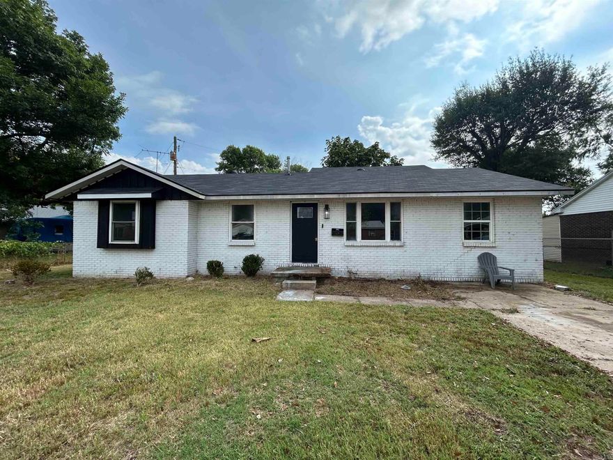 This 4 bedroom, 2.5 bath brick home with a vinyl add on has plenty of space and charm. Step inside to vaulted ceilings that make the living area feel open and inviting. The split floor plan provides privacy, with a large master suite featuring an ensuite bathroom and a walk-in closet. With its thoughtful layout and room for everyone, this home is ready for its new owners!