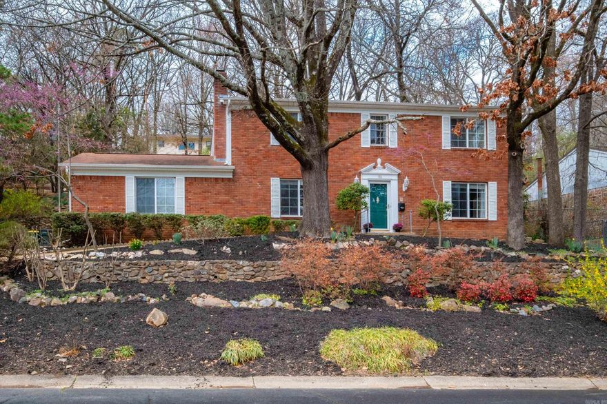 Midtown traditional with zen-like vibe. Close to UAMS, area hospitals and shopping. Updated kitchen that opens to deck and terraced, low maintenance backyard with koi pond. Lots of indoor and outdoor space for entertaining. Two of the bedrooms upstairs are oversized. No carpet. Two car garage, gas water heater (2025). Refrigerator conveys.