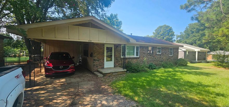 This is a well-maintained 3-bedroom, 1.5-bathroom home in a charming neighborhood! The property features a carport for convenient parking, a backyard shed for additional storage, a privacy fence enclosing the rear yard, and recently installed windows that enhance energy efficiency and natural light. The interior includes a spacious living area, a well-equipped kitchen adjacent to the dining space, and three bedrooms suitable for family, guests, or home office use. The private backyard is ideal for outdoor activities!