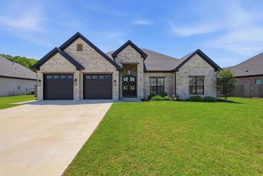 Welcome to 2425 Lilac Dr. in Conway, Arkansas, an IMMACULATE, custom built home in 2022 offering luxury finishes, functional design & exceptional outdoor living. It’s perfect for homebuyers searching for newer homes in Conway AR with upgraded features and extra parking space for cars, RV, and outdoor toys. This 4 bedroom, 2.5 bathroom home features LVP flooring throughout, tile in bathrooms & laundry, and walk in closets. The 4th bedroom can also be an office. The kitchen is beautifully designed w/ an oversized quartz island, deep porcelain sink, ceiling height cabinets w/ custom pull outs, walk in pantry, 5 burner gas range & stainless steel appliances. Living area has vaulted ceiling w/ wood beams and a stunning stone fireplace. The primary suite feels like a private retreat w/ an electric fireplace, soaker tub, oversized walk in shower, dual quartz vanities & lg walk-in closet. Outdoor living includes lg covered patio, pergola, rollaway privacy shades, shed and fully fenced backyard. Additional features, oversized heated garage w/ backyard access, floored attic space, attic fan & motorized shade on front doors. Schedule your private tour today and see why this home stands out.