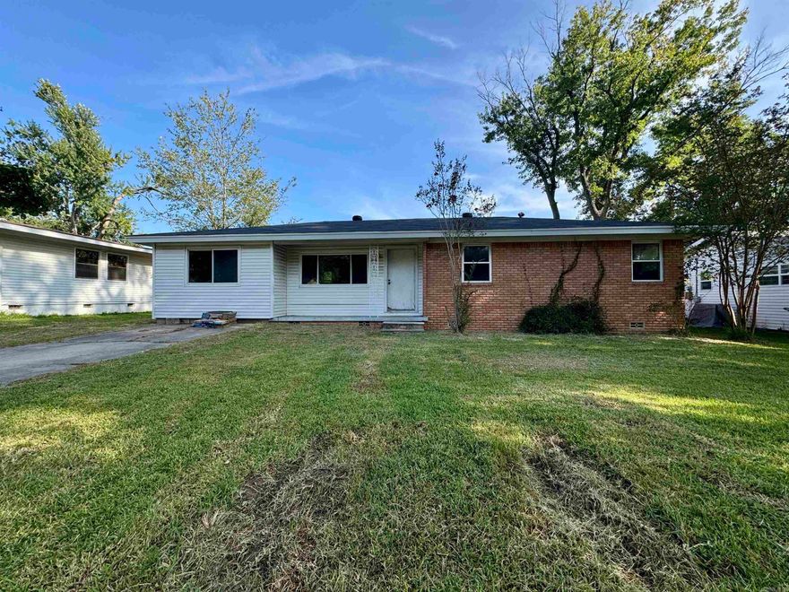 There's space for everyone in this Sherwood home! In addition to the main living area, the carport was enclosed to create a second living area that could be used as a playroom or home office. The large level lot is fully fenced with lots of room in the backyard. You will love the 20 X 40 shed/storage building. This home would be great for an investor or for a homeowner who wants a fixer upper. Lots of potential! Home is being sold as-is. The above ground pool does not convey. Agents see remarks.