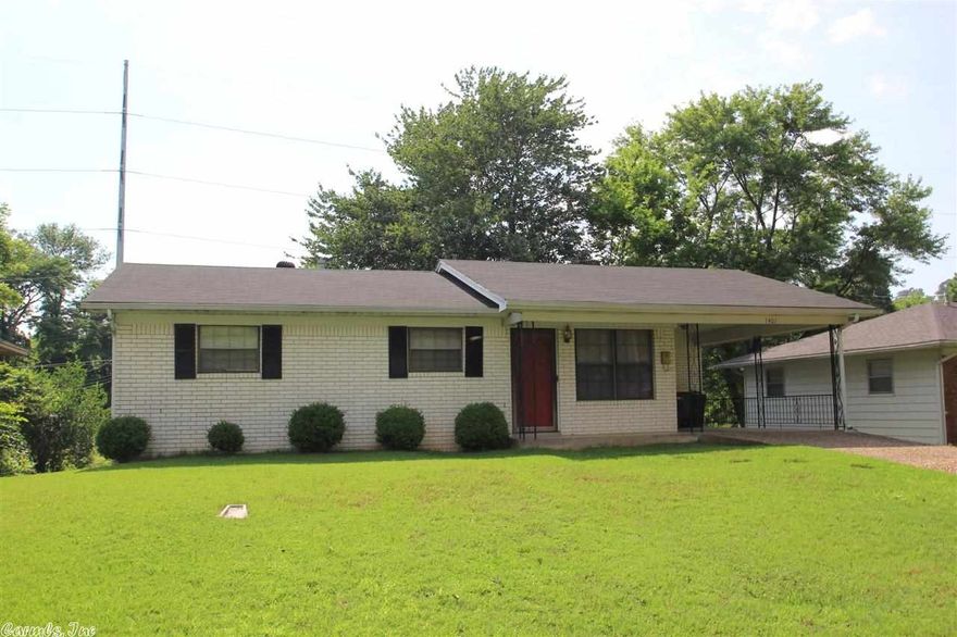 LARGE, very nice all brick home nestled in front of green space and AR River Trail, 4 bedrooms, 1.5 baths, large finished basement, tile and hardwoods, built-in's, storm windows, covered patio, updated HVAC, hot water heater, painted, large storage areas inside and outside this home, located on a dead end street, close to Dickey Stephens Ball Park and downtown, also centrally located to VA Hospital and ACH. This home is large and spacious for a growing family.