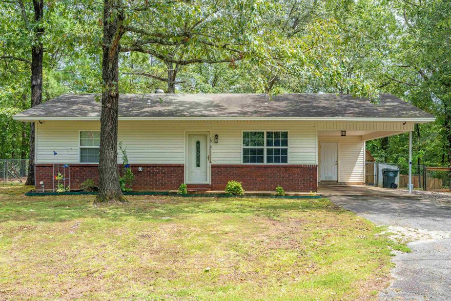 Welcome to this gorgeous little home in Hot Springs! A cozy house with brick and vinyl in a secluded part of town offering peaceful atmosphere, yet still conveniently close to the town's amenities. Perfect for a small family or those looking for a starter home! Call for a showing today!