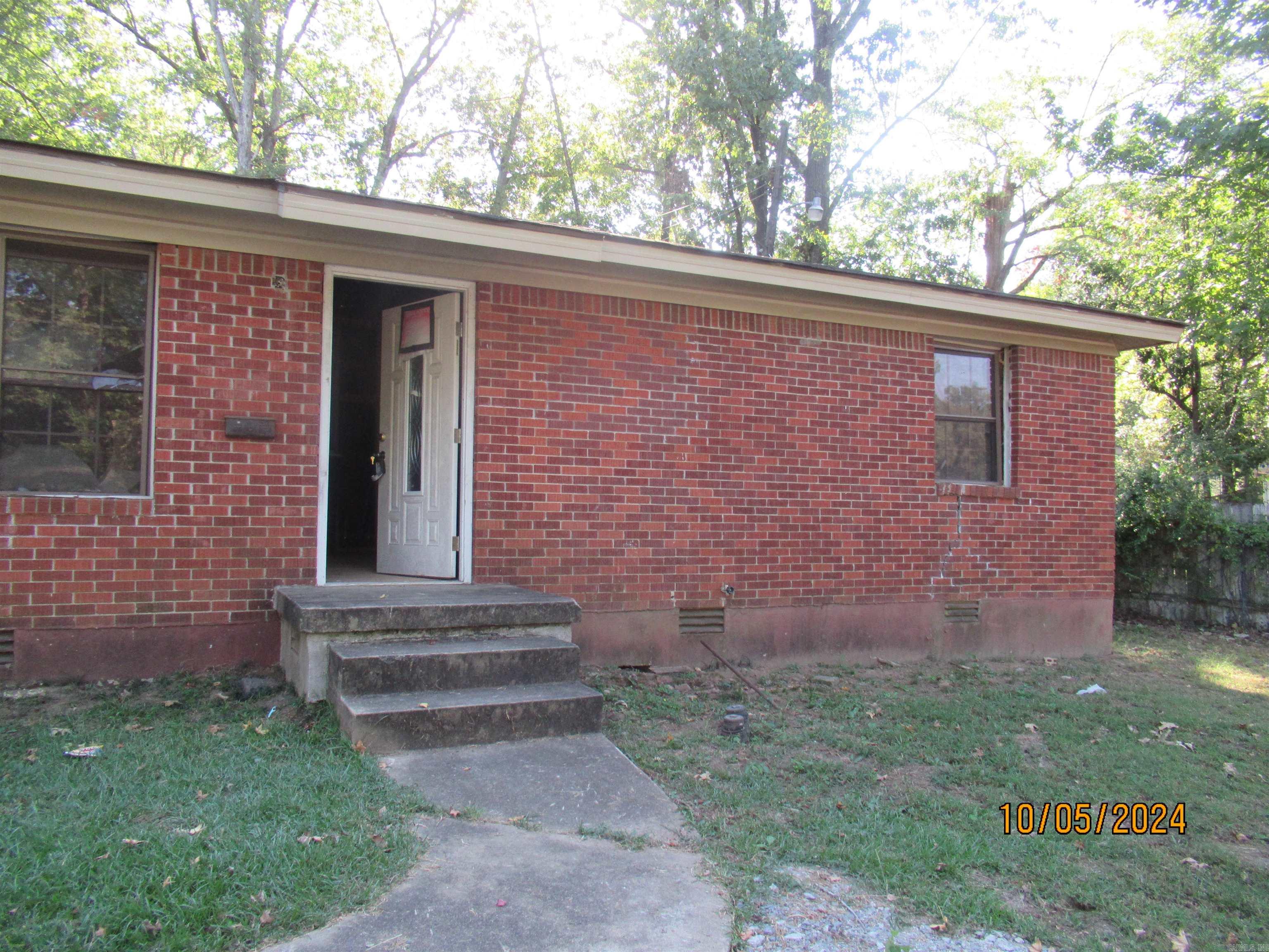 INVESTORS!! THIS HOME HAS BEEN GUTTED WITH FLOORING PLY BOARD PLACED IN HOME ; READY FOR THE HANDYMAN; TREES HAVE BEEN CUT FOR YOU; A LARGE CONCRETE PATIO HAS BEEN POURED AS WELL; NO DISCLOSURES;SOLD AS IS ;CASH ONLY GREAT REHAB!!!