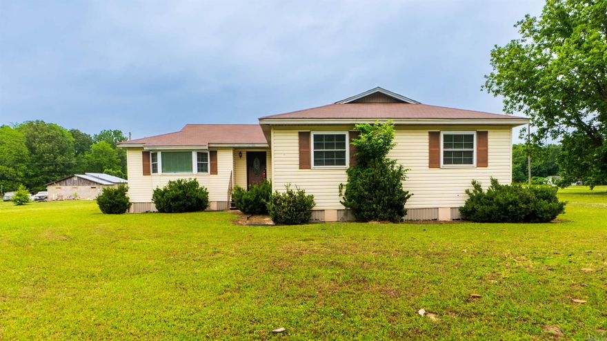 Opportunity awaits with this spacious 4-bedroom, 2-bath home offering approximately 1,800 square feet of living space on a generous 0.41-acre lot. Built in 2002, this property features a functional layout with large living areas, a dedicated dining space with chandelier, spacious kitchen with abundant cabinet storage, and a split-bedroom design that provides flexibility for a variety of living needs.  The oversized primary suite offers plenty of room to unwind, while additional bedrooms can easily accommodate family, guests, or a home office setup. Outside, you will find a large yard with room to enjoy outdoor living, gardening, or future improvements.  This home does need some updating and cosmetic improvements, making it an excellent opportunity for investors, flippers, or buyers looking to add their own personal touch and build equity. With solid square footage, a desirable layout, and a peaceful setting just under half an acre, this property has great potential.