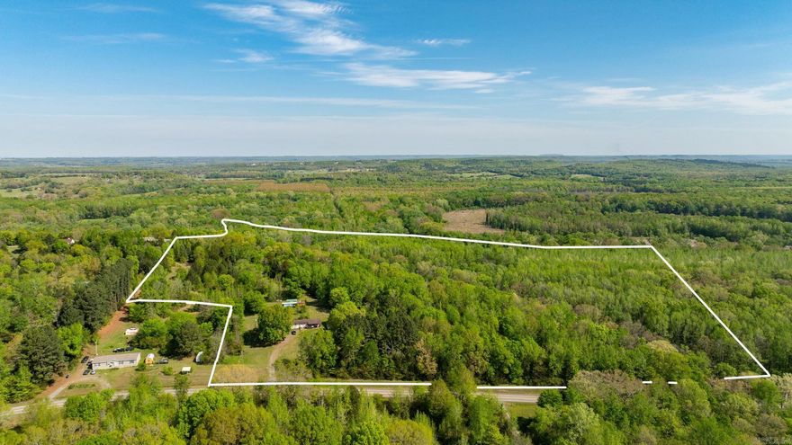 RARE FIND! $7000/ACRE with septic, electric, and water meter already on the property! 37.97 acres of opportunity ready for your vision. This beautiful tract already has key utilities in place saving you time and expense as you plan your dream home, weekend retreat, or investment property.  Nature takes center stage here, with the stunning Cadron Creek bluff tracing the back and side property lines, offering scenic views, privacy, and a peaceful backdrop you simply can’t recreate. Whether you’re looking to build, develop, or just enjoy wide-open space, this property delivers both convenience and character.  There are existing structures on the property that will convey at no value, giving you flexibility to clear, renovate, or repurpose as you see fit.  If you’ve been searching for land that already has the groundwork started and a setting that stands out, this is it. Survey on file! Be sure to watch the drone video here: https://listings.keyimageworks.com/videos/019d77ab-8cf1-7360-ab4b-e1be5dfad88e  Agents, see remarks for showings.