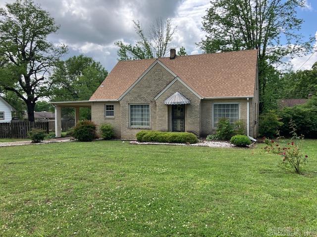 Charming Brick Home in Pocahontas, AR. Nestled in the heart of the scenic Ozarks of North Arkansas, this 3 bedroom house offers a perfect blend of comfort and affordability. Situated on a nice level lot, this property boasts a well maintained lawn, ample landscaping with lots of color, amongst a backdrop of mature trees. Inside, you will find a welcoming interior with large rooms and large windows that allow for natural light. The kitchen is large with lots of cabinets. The home features a newly installed roof, with approximately four years of labor and material warranty left that is transferable. Beyond that the material warranty extends for longer, ensuring peace of mind for years to come. Also included is a brand new oven and a new fridge. Both downstairs bedrooms have his and hers closets. The unfinished basement provides for extra storage space as well. Located in a quiet neighborhood, this home offers the best of small town living with easy access to the natural wonders of Arkansas, including hiking, fishing, boating, exploring nearby attractions and more.