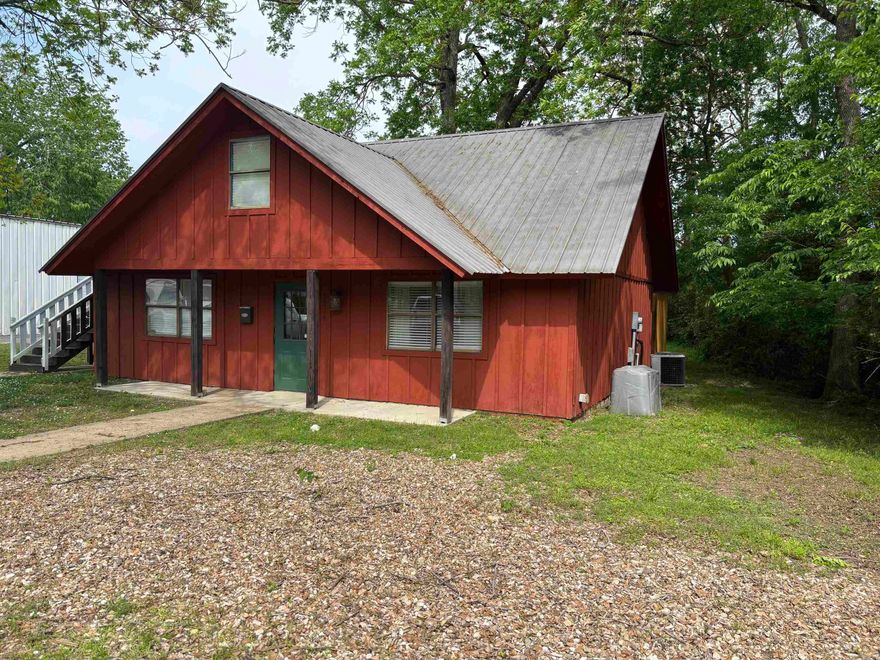 Great office opportunity!  Waiting area, registration desk, offices, conference room.  660 sq ft living space upstairs.  ADA Compliant, All doors have separate locks. 10’X16’ storage building in back.  Would also make a great salon.  Original salon plumbing still in the back wall.