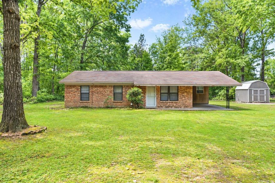 Welcome to this 3-bedroom, 1-bathroom home situated on approximately one acre, offering peaceful country living just outside the city limits on a quiet street. Inside, you’ll find updated flooring completed in 2018, creating a clean and inviting living space. The kitchen comes equipped with a dishwasher (2018), and all appliances—including the washer, dryer, and refrigerator—will convey with the home. Major system updates provide added peace of mind, including a new water heater installed in 2018 and an HVAC system replaced in 2020. The septic system was last pumped in 2021. Outside, enjoy the space and privacy of a full acre, along with a storage building in excellent condition that will remain with the property—perfect for tools, equipment, or extra storage needs. If you’re looking for a quiet setting with room to spread out, this property is for you! Schedule your showing today!