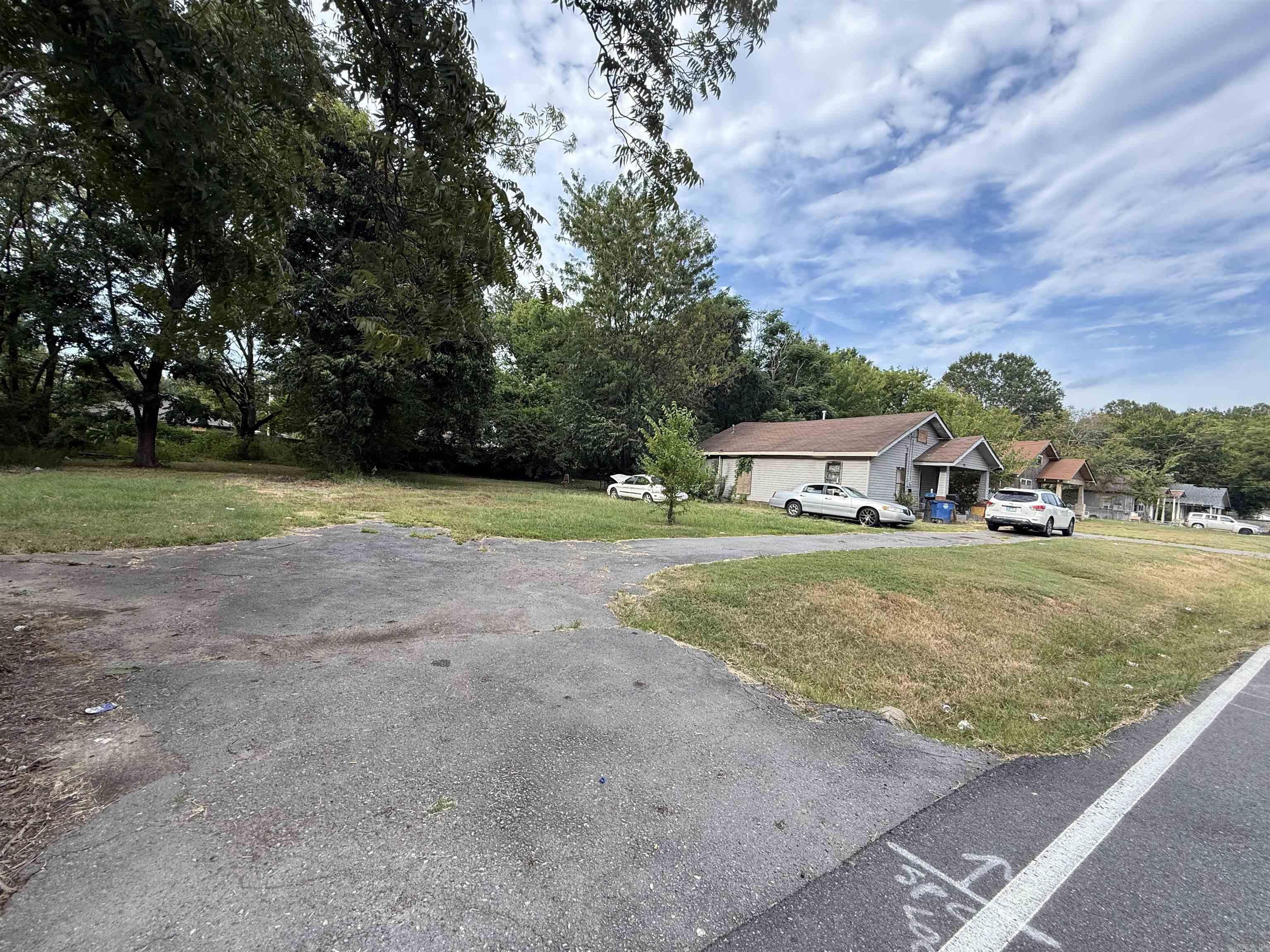 Investors & developersāthis oneās calling your name! This package includes a 2-bedroom, 1-bathroom home at 617 W. 22nd St. ready for a full renovation or tear-down plus three vacant lots right next door. House is tenant occupied DO NOT DISTURB TENANTS PLEASE. Prime location just steps from North Little Rock High School and minutes to downtown.