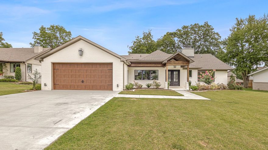 Beautiful Birdland Home & COMPLETELY remodeled! 5 bedrooms, 4 1/2 bathrooms, 2 living areas, 2 fireplaces, and 2 laundry rooms. This wonderful family home has everything new! Iron doors leading into living room with 2 story fireplace in the vaulted living room is a showstopper. Hardwood flooring throughout is stunning, and kitchen is open to large dining room. New master ensuite with launrdy room on main level is amazing. So much to see! The upper level will have floating stairs with black iron rails to match front door. Call today!