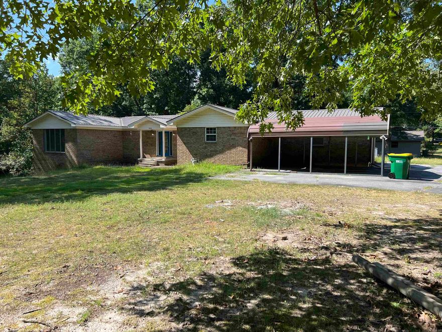 Beautifully remodeled rural property on nearly an acre sized corner lot. Features of this 4 bedroom, 1.5 bathroom house include: metal roof, updated kitchen with quartz countertops and open shelving, large living area, built ins in primary closet, primary on suite bathroom, fully fenced in back yard and a large front yard. Call to set up a showing for this fantastic family home today. Owner Financing Available.  AGENTS SEE REMARKS