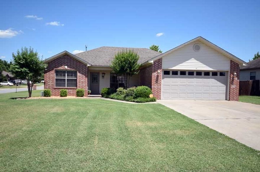 Charming split floorplan 3 bedroom, 2 bath in great neighborhood! Large corner lot with nice back deck. Fully fenced backyard. Fresh paint and new hardwood flooring in den and master bedroom. Fireplace. Covered front porch. Must see!