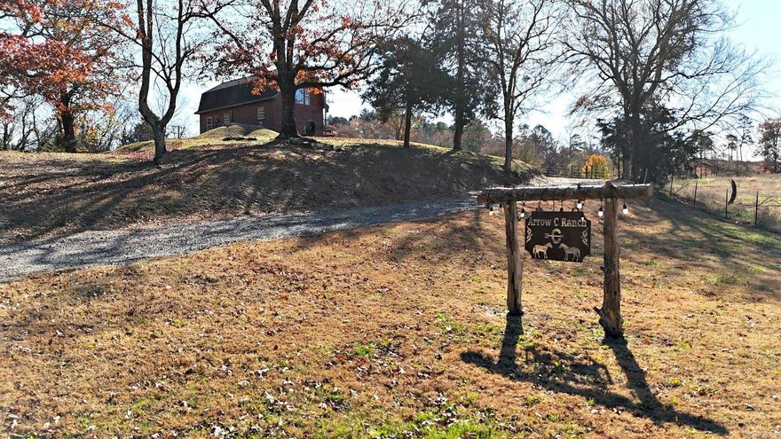 Rustic 2-Bed Cabin on 9.98 Acres – Your Gateway to Adventure! Nestled between Wolf Pen Gap and Fourche Mountain Trail systems, this 2-bedroom, 1-bath cabin offers 928 square feet of cozy, rustic living with wood ceilings and cottage style doors. Built in 2019, it’s move-in ready and full of character. Step outside to discover a spacious 9.98-acre property featuring a versatile barn with a loft, tack room, storage, and stalls; perfect for entertaining, horses, or gear. The barn opens at both ends, making it easy to access your toys or host gatherings. Enjoy a peaceful pond, open pasture, and endless outdoor possibilities. Located just minutes from the Ouachita River, Big Fork Creek, and Mill Creek, this property is ideal for fishing, floating, or exploring the great outdoors. With rural water available (currently on well), this spot is perfect for a homestead, weekend getaway, Airbnb, or event venue. Live the country life with adventure at your doorstep. Don’t miss this rare opportunity!