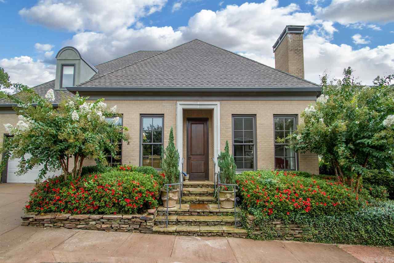 Spectacular custom home in Canal Point.  Gorgeous design and fabulous décor offers world class living and a wonderful setting for entertaining.  Stunning formal living and dining.  Gourmet kitchen and large open family room with fireplace and built ins adjacent covered terrace. Luxurious master suite on the main floor along with 2 guest suites and office. Additional bedroom suite up. Double garage with storage and additional one bay garage. Beautiful gated neighborhood with canal and river views.