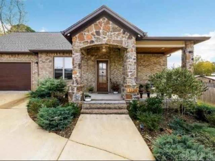 Welcome to this beautifully crafted brick home with an elegant stone entryway, perfectly positioned in the highly sought-after Salem area. This spacious 4-bedroom, 2.5 bath, single-level layout offers both comfort and convenience, all within the award-winning Bryant School District. Step inside to a bright, open living space featuring a cozy gas fireplace, generous room sizes, and great floorpan. The home is built with energy-efficient upgrades, including a ZIP wall system, foam encapsulated, high-efficiency HVAC, and low-E windows, providing year-round comfort and lower utility costs. You'll love the three-car garage, extended driveway with ample parking, and walk-up attic access-perfect for storage. The private lot is well maintained and offers peaceful surroundings with community amenities just steps away: Two green space areas with a community garden, pavilion and pond. Swimming pool and clubhouse. Beautiful sidewalks and neighborhood charm with AT&T high-speed fiber internet, this home seamlessly blends modern convenience with timeless comfort. Enjoy the best of Salem living in a location that truly has it all.