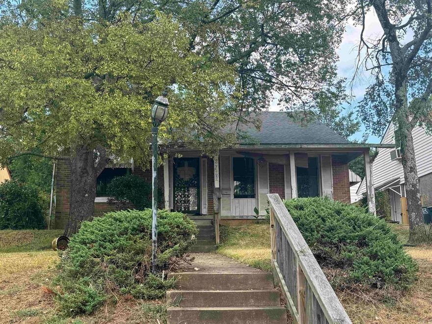 4 bed 2 bath mostly brick home surrounded by nice houses in downtown. Cute cottage/bungalow style house. House seems solid but needs updating, painting, etc.   Was occupied until July 2024 so it is liveable. Appears to have original hardwood in most of the house and they are in decent shape. Could be a very nice place with some work. Recent foreclosure, not REO or bank owned. Local corporate owner can close quickly. Sold as is, no disclosure. SEE AGENT REMARKS for offer submission & other info.
