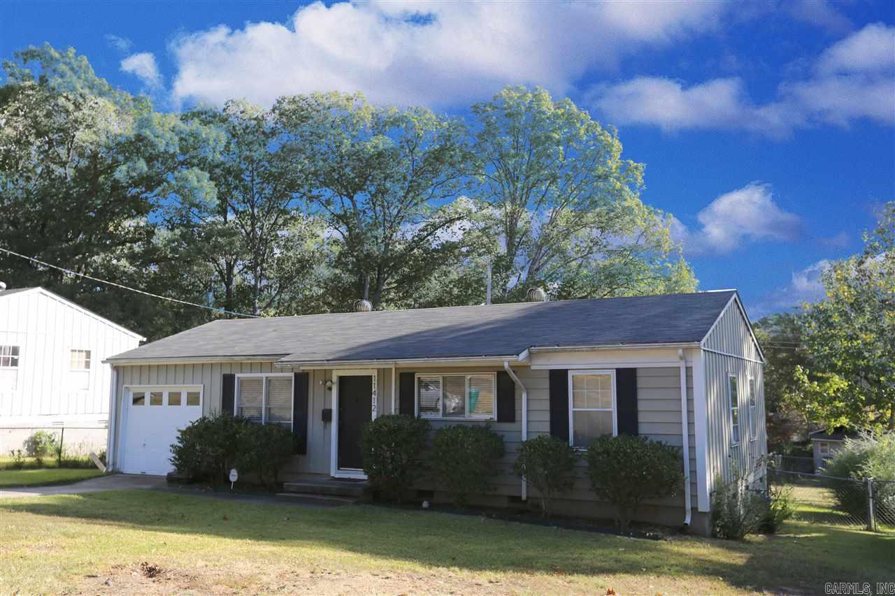 Located in great West Little Rock neighborhood close to shopping and restaurants. Includes a large fenced-in backyard, hardwood floors and a 1 car garage.