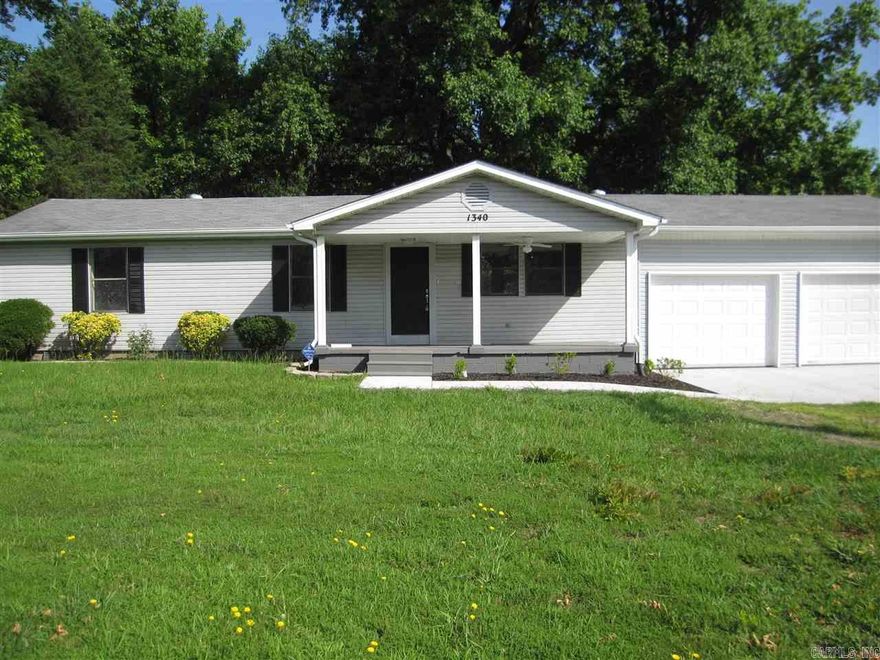 The perfect starter home that looks so luxurious with new granite countertops, stainless steel appliances, brand new paint, hardwood laminates, ceramic tile, carpet in the bedrooms, gutters, sidewalk, garage door, HVAC, recessed lighting, interior doors, and Deck. Back yard features a Shop and inground Storm shelter. Sq. Ft. approx. measuring encouraged.