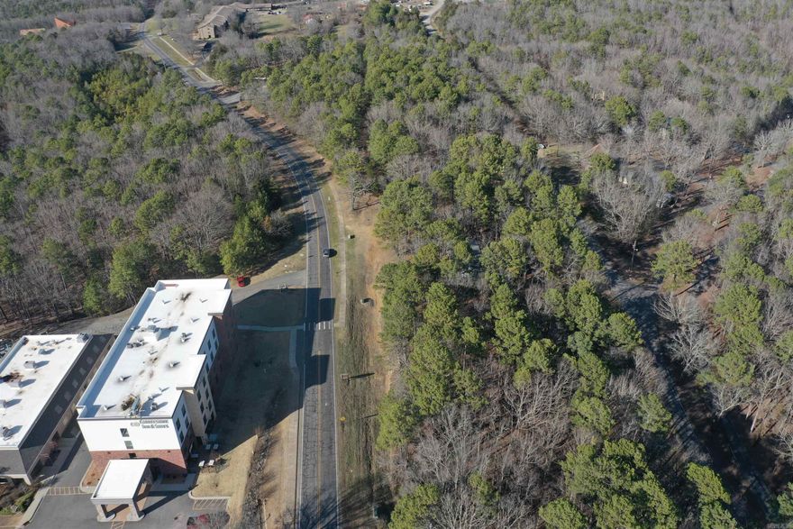 Welcome to market this vacant land zoned COMMERICAL right on Dave Creek Parkway. You can build your perfect business right in the heart of Fairfield Bay with main road frontage, good for boat storages, carwash, office building, Drive in movie, Property has utilities at street level. Is currently in 4 tracts that were divided then deeded as a whole and offered only as a whole. Buyer could then subdivide to make 4 commercial properties. Subdivision, development, or improvement of the property requires approval of the Planning and Zoning.