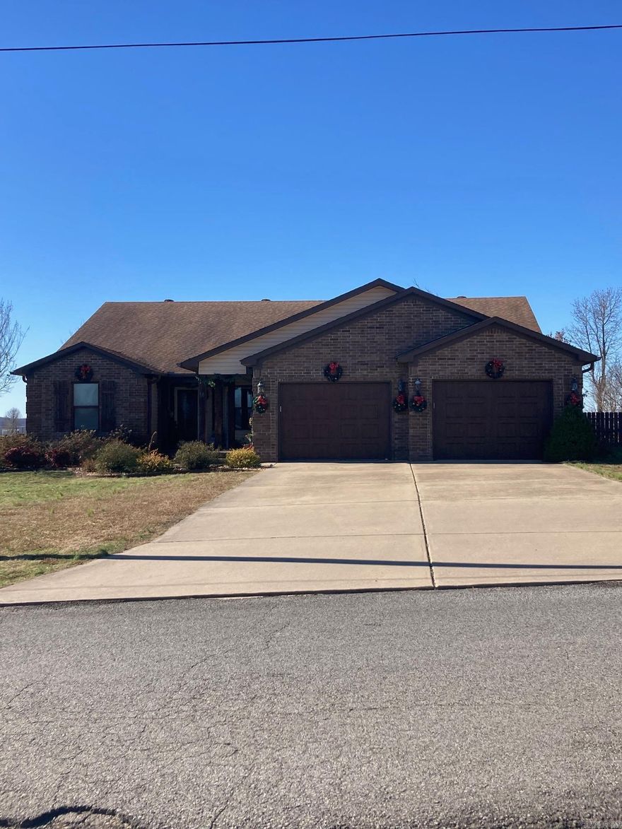 This Large 4bd, 2.5ba home with 30x40 shop has so many great features! Offering a formal dining room, split floor plan, 18x26 living room with space for entertaining, 14x18 laundry room with half bath. Master bath has oversized step in shower, his and hers closet and an 8x16 certified safe room. One side of the garage is longer (24ft), making it feasible for large vehicles and has an "elevator" for raising/lowering totes into the attic! The shop is 30x40 with high sidewalls, insulated walls, ceiling and overhead door. It also has 110 and 220 electricity and a separate water meter for outdoor use. The back yard is fully fenced. This home could be just the place for you to raise a family, entertain and have a great shop building!