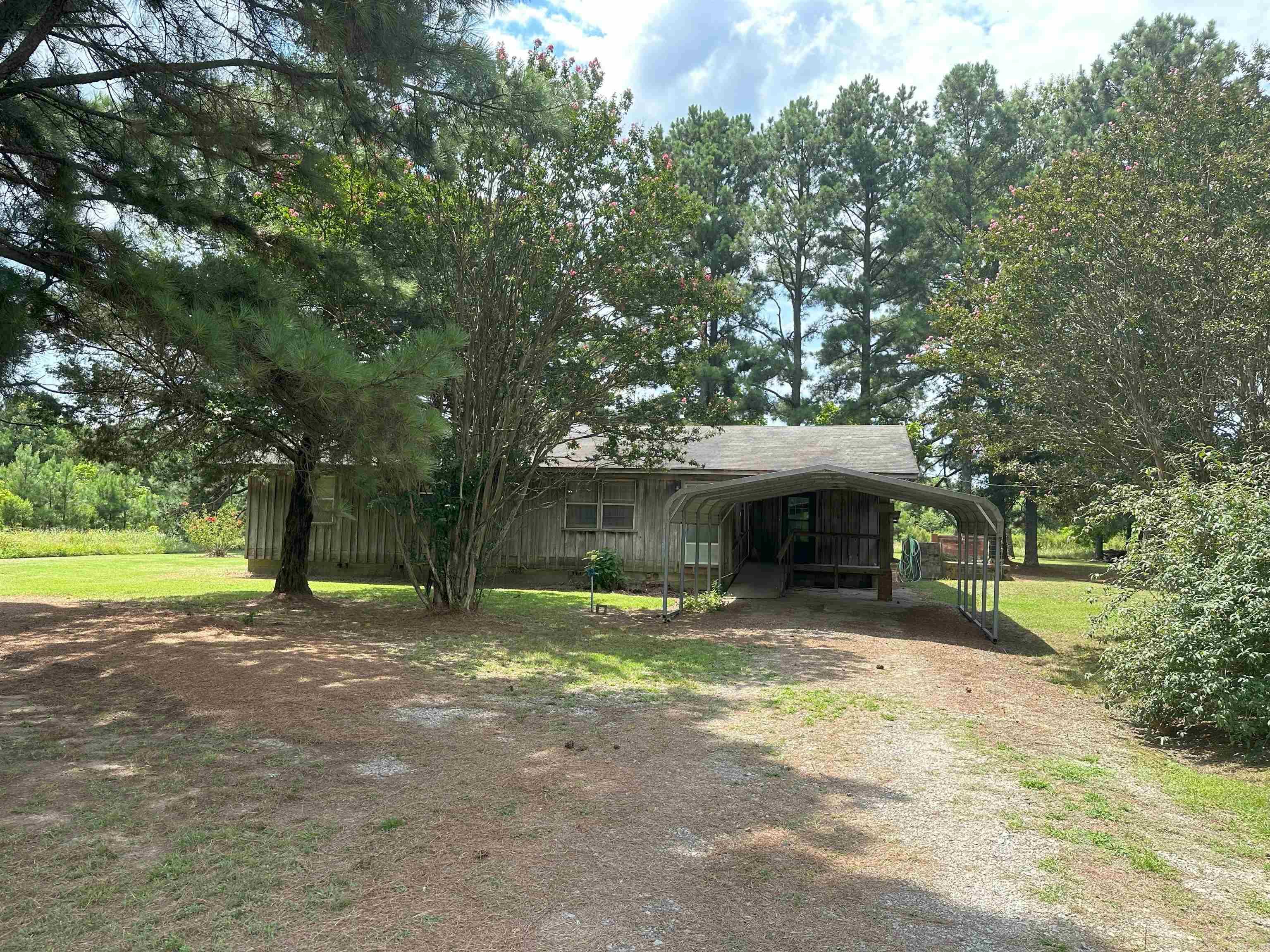 This 1,400 square foot home sits on an acre lot with a storage shed out back. It has two bedrooms and one and a half bathrooms. It comes with all the appliances and mostly furnished. It is located 10 minutes from Bald Knob, 14 minutes from Hurricane Lake WMA, and 12 minutes from Bald Knob Wildlife Refuge for any hunters. Mineral rights do not convey.