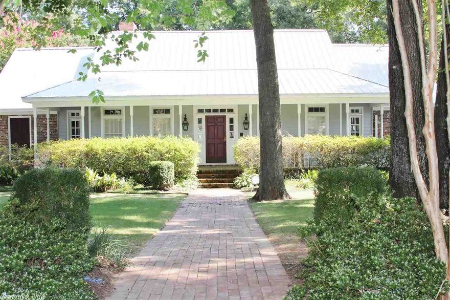 Fabulous Custom Built Home--ONE OF A KIND AND BEAUTIFUL!  This home was designed and built by two architects. House has separate living quarters also used as Pool house with loft and full bath (included in square footage). Home has been updated and includes a concrete pool with built-in spa, built-in stove with double ovens, washer and dryer, and refrigerator all conveys. Fireplace in Master.  Screened-in back porch and garden like setting overlooking the 18th green at the new Southern Oaks Country Club.