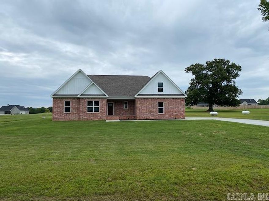 Great floorplan!! 4 bedrooms and 2 bath downstairs. Upstairs is a bonus room that could also be a bedroom since it has a closet. There is also a full bath upstairs. The kitchen has cabinetry all the way to the ceiling. Breakfast bar and large pantry.  Built in cabinets and shelving beside the gas log fireplace. Laundry has extra cabinetry and a sink. Covered back porch overlooking the massive backyard. Cabinets in the kitchen and bathrooms will be stained. Living room and laundry room cabinets will be painted. White quartz in the kitchen and black granite in the bathrooms. Black light fixtures and stainless steel plumbing fixtures. Accessible beige on the wall paint and alabaster white trim. Light tan LVP flooring everywhere except the bathrooms and that will be white tile. Bonus room to be carpet. Tile surround on the fireplace. Agents see remarks