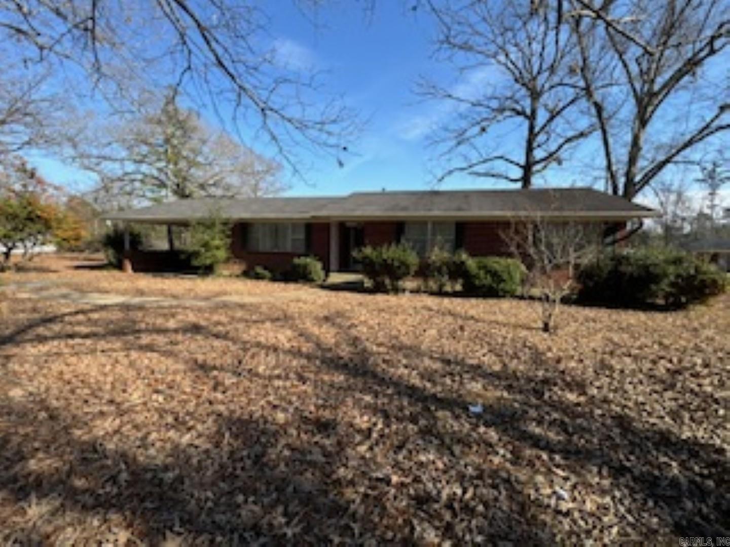 Move-in ready and close town, this well-cared-for brick home features 3 bedrooms, 2 baths, and 2-car car. Inside, the boasts real wood cabinets ample space for an island, and a peninsula separating the kitchen and room. The living room is spacious, accommodating a sectional or large furniture comfortably. The suite is well-designed with a vanity and dressing area. All 3 bedrooms have large windows and 2 of them feature double closets. Hardwood floors lie beneath the carpet. Outside, is a wonderful, covered deck, perfect for a cooking area, picnic table, or outdoor ping pong game. property is well-built, very, and clean.