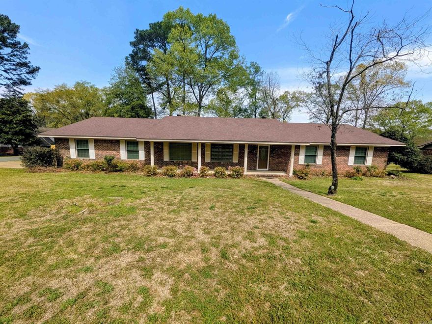 Prepare to be impressed by all the special updates & custom features in this beautifully renovated 3 BR/2 BA brick home! Every detail has been thoughtfully upgraded to combine style, comfort, & functionality. The heart of the home is the chef’s kitchen, featuring new appliances, a 6-burner gas stove, microwave drawer, butcher block countertops, floating shelving, custom cabinetry, copper hardware, a new sink, & tile backsplash & flooring. A mobile center island w/ storage underneath adds convenience & versatility, while built-ins & a large double-door pantry provide exceptional storage. The kitchen/dining area overlooks a large covered deck w/ a cathedral ceiling, along w/ a beautiful backyard complete w/ a privacy fence & 2 storage buildings. Inside, updated include new wood flooring, fresh paint, & remodeled bathrooms. Enjoy spacious BRs w/ ample closet space & 2 separate living areas, offering flexibility for everyday living. The cozy family room features a custom fireplace w/ gas logs, while the living room includes an additional dining space. Additional highlights include new ceiling fans, LED lighting throughout, & a sprinkler system for easy lawn maintenance. Don't miss out!