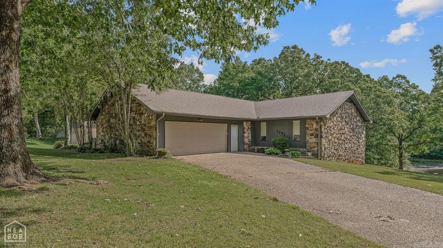 Tucked away on 3.18 acres inside the city limits of Paragould, this one-of-a-kind property offers a pond and shop. It is the perfect mix of space, privacy, and convenience. This 3-bedroom, 3-bath home features over 2,600 square feet of living space with beautiful views, mature trees, and room to truly spread out. Inside, you'll love the updated kitchen complete with granite countertops and modern cabinetry. The spacious living room is full of character with wooden vaulted ceilings, beams, and a stunning stone gas-burning fireplace that creates a warm and inviting space. An oversized laundry room provides incredible flexibility and could easily serve as a fourth bedroom, office, hobby room, or additional storage space if needed. Step outside and enjoy everything this property has to offer from a large oversized back deck perfect for entertaining to relaxing while overlooking the acreage, pond, and peaceful setting. Additional exterior features include an above-ground pool, detached shop, and double garage. Properties offering acreage, privacy, and amenities like this all within city limits are hard to find.