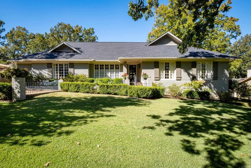 Exquisite one level Pleasant Valley/Longlea home with loads of updates, extras & a split floor plan! Large living room has vaulted ceiling, wood burning fireplace & large windows overlooking the deck & backyard. Large formal dining rom. The kitchen has been updated w/ quartz countertops, stainless steel appliances, double ovens, large pantry, island & leads to a lovely bkft/morning rm w/vaulted ceilings. The master bedroom nicely sized w/windows that provide plenty of light. The master bath has been updated w/a separate jetted tub, steam shower, heated floors, 2 vanities & a large closet w/a separate cedar closet. 2 bedrooms w/a bath on one side of the house & a bedroom & bath on the other. Hardwood floors along w/ carpet in some bedrooms. The backyard has a large deck w/ a portion that is covered, in ground pool & impeccable landscaping. Garage is rear loading w/ a hobby room including a sink. Large under house storage has poured concrete floor. Interior stairway leads to unfinished attic w/ approx  600 SQFT, ideal for a game room finish out. Fresh paint inside and out. 3 year old roof, newer HVAC.