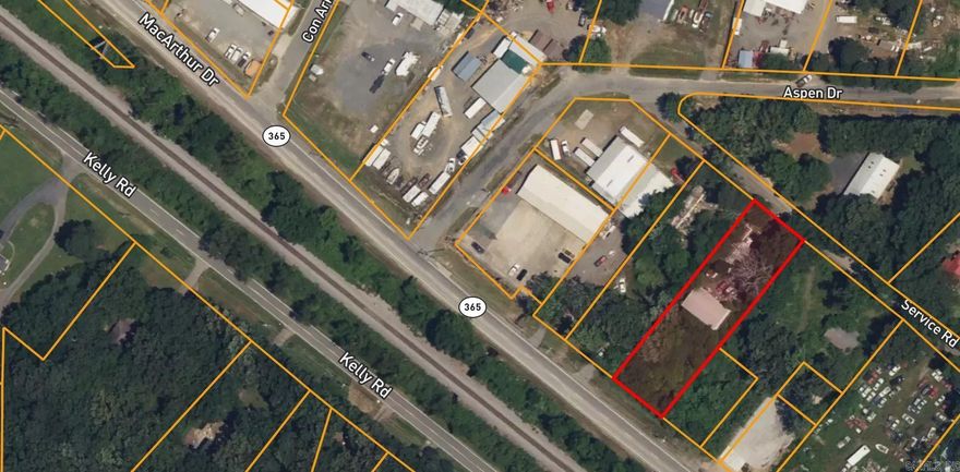 Half-acre lot in Oak Grove with a mobile home that could be repaired to live in, & a large, 3 rolling door, metal building on a concrete slab. City sewage could be connected.