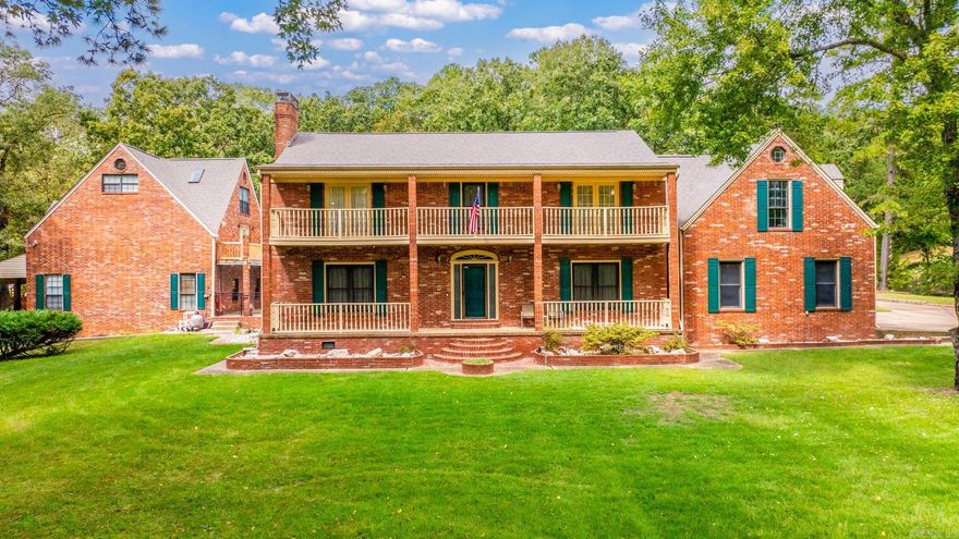 This unique property sits on 3 acres and offers both a spacious main residence and a fully equipped guest home, each with a brand-new roof and all-brick construction. The main home features 3,528 square feet of living space with 4 bedrooms, 2.5 baths, an office, a bonus room, two living areas, a formal dining room, laundry, and a kitchen with an eat-in area, all complemented by a side-load 2-car garage. The 1,016-square-foot guest house (built in 1997) is equally impressive, complete with its own kitchen, living room, laundry, bathroom, and loft-style bedroom. It also includes a heated and cooled garage/shop, along with a rear carport ideal for mowers or additional vehicles. Both homes share a private backyard retreat, backing up to a sparkling pool perfect for entertaining or relaxing. Set back from the road for added privacy, this property provides the perfect balance of space, function, and comfort for multi-generational living or hosting guests.